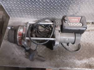 lot 20 image: Warn 15,000 Winch (May Be Missing Parts)