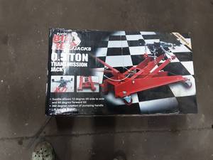 lot 93 image: New In Box Big Red Transmission Jack 12 Ton