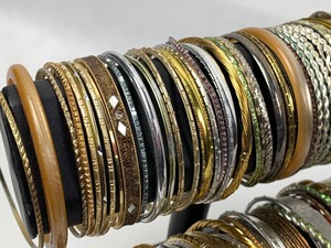 lot 419 image: Misc. Costume Jewelry Lot - Bangles, Brooches and A Mother-Of-Pearl Hair Ornament