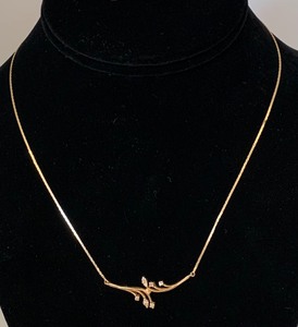 lot 28 image: 14K Yellow Gold Chevron Necklace w 8 (assumed) Diamonds, 16 Long