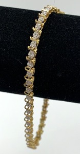 lot 6 image: 14K Diamond Tennis Bracelet (3.5 DWT) In Yellow Gold - 7 Long,  Original Tag