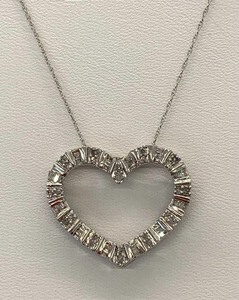 lot 8 image: 10K Diamond (.5TCW) Heart Pendant on a 18 10K White Gold Chain,  Original Tag