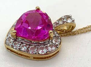 lot 16 image: Brilliant 4.65 Cr Pink Sapphire Heart Pendant w 17 Cr Sapphire Accents on 18 10K Chain,  Original Tag