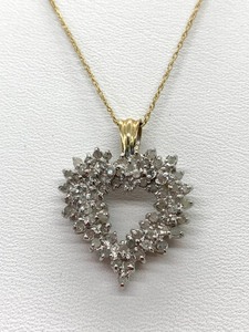 lot 23 image: Intricate Diamond Heart Pendant (.5 CTTW) in 10 K Gold, on 18 Gold Chain, Original Tag