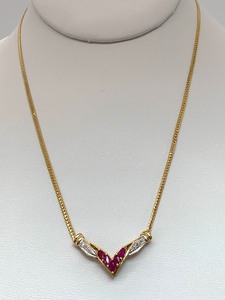 lot 33 image: 10K Gold Genuine Ruby Chevron Pendant (.5 TW), Flat Serpentine 16 Chain, Original Tags