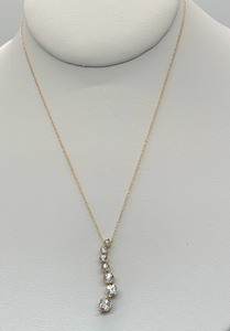 lot 34 image: 7-Stone Sim. Diamond Pendant Necklace in 10K Yellow Gold w 18 Chain