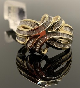 lot 43 image: Knot Style Diamond Ring (1.0 TW, many tiny baguettes) in 10K Gold, Size 8, Original Tag