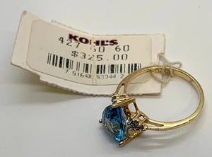 lot 46 image: Triangle-Cut (Assumed) Blue Topaz Ring In 10K Yellow Gold, size 7-12, Original Tag