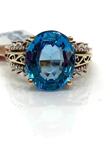 lot 50 image: (Assumed) Blue Topaz Ring In 10K Yellow Gold, Size 7-14, Original Tag
