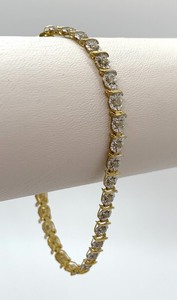 lot 55 image: Diamond Tennis Bracelet (1 CT TW) In 10K Gold, Rose Pattern, Length 7, Original Tag