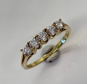 lot 87 image: 10K Yellow Gold Ring w Row of 5 Round CZ Stones, Size 7
