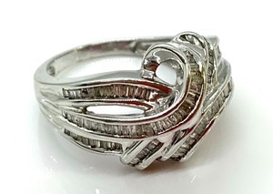 lot 113 image: 10K White Gold Knot Style Ring w Channels of Many Baguettes, Size 8