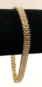lot 128 image: Gold Over Sterling Silver (Assumed) Diamond Tennis Bracelet, Length 7-14