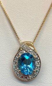 lot 135 image: Gold Over Sterling Silver Oval (Assumed) Blue Topaz Pendant Necklace On 18 Chain