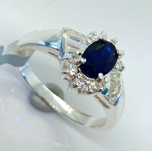 lot 154 image: Sterling Silver Ring wCr Deep Blue Oval Sapphire and CZ Chips and Baguettes, Size 8, Orig. Tag