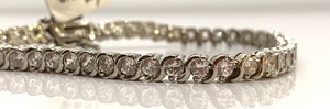 lot 165 image: 7 Sterling Silver Tennis Bracelet w Many Simulated Diamonds, Original Tag