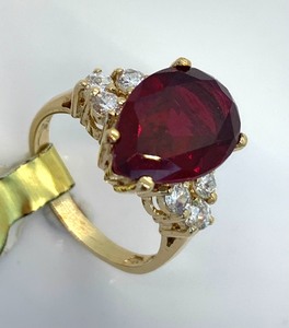 lot 179 image: Gold Over Sterling Silver Teardrop (Assumed) Garnet Ring w 6 White Side Stones, Size 5