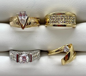 lot 320 image: Fashion Rings, Size 7-34, Group A - 4 Rings, All Simulated Diamonds