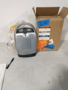 lot 24 image: LASKO Compact 11.25 in. 1500-Watt Electric Ceramic Portable Oscillating Space Heater