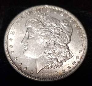 lot 09 image: 1899-S MORGAN SILVER DOLLAR BETTER DATE IN HIGHER GRADE