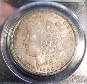 lot 23 image: 1886 MORGAN SILVER DOLLAR MS63 PCGS
