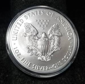 lot 31 image: 2021 AMERICAN SILVER EAGLE 1 TROY OZ. .999 FINE SILVER IN AIRTITE