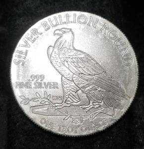 lot 47 image: 1 TROY OZ. .999 FINE SILVER INCUSE INDIAN DESIGN