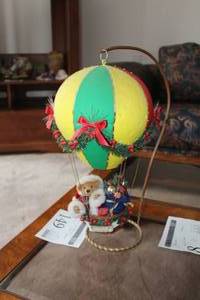 lot 149 image: Happy Holidays Christmas Bear In Hot Air Balloon Table Decor 17H