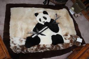 lot 11 image: Alpaca Petes Handmade Alpaca Rug with Panda Bear Eating Reeds and Brown Border 64Lx48W