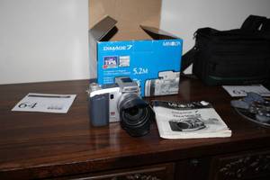 lot 64 image: Minolta Dimage 7 Camera with Lens, Lens Hood, Instructions Dimage 7 (in box)