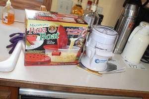 lot 161 image: Lot of (2) Kitchenware - Ultimate Chopper Food Processor with Accessories, Microwave Pasta Boat (in box)