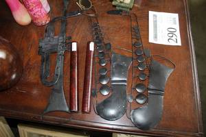 lot 290 image: Lot of (5) Musical Instrument Wall Dcor - Metal (x3), Wood Sticks (x2)