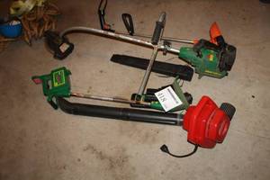 lot 418 image: Lot of (4) Yard Equipment - Weed Eater 12V Cordless Handystik Lite Weed Whip,  Weed Eater Line Trimmer, Rake-O-Vac Blower, Edger