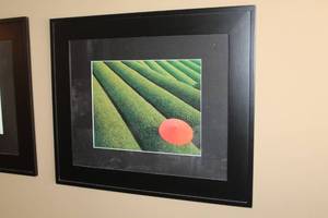 lot 223 image: Red Umbrella In Green Hills Matted Framed Wall Art 25Wx21H