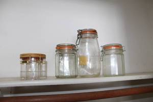 lot 263 image: Lot of (4) Glass Jars with Flip Top Snap Lid