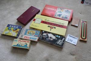 lot 239 image: Lot of (9) Board Games - Flinch, Password, Monopoly, Careers, Back-o, Mastermind, Scrabble, Cribbage (in original boxes)