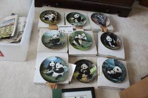 lot 73 image: Lot of (9) W.L. George Fine China Fine Porcelain Collectors Plates - Panda Bear by Will Nelson  (x8), Koala Bear by Charles Frace  (x1) (in box)