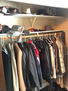 lot 147 image: Entire Contents of Closet - Coats Jackets Purses Leather Boots etc