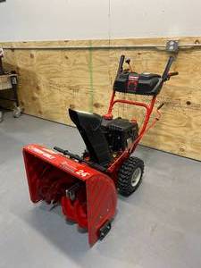 lot 1 image: TROY-BILT 24 in. 208 cc Two-Stage Gas Snow Blower with Electric Start Self Propelled