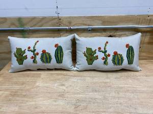 lot 109 image: HAMPTON BAY Lot of 2-  Cactus Lumbar Outdoor Lumbar Throw Pillows