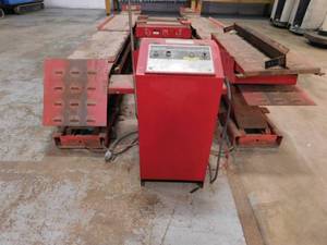 lot 4 image: Hunter RL Drive On 8000lb  Vehicle Hoist  Alignment Rack