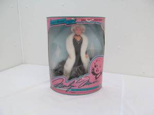 lot 1 image: Marilyn Monroe doll