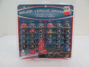 lot 19 image: Major league Baseball helmets on standing board