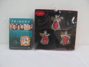 lot 125 image: Friends DVDS, Angel frames