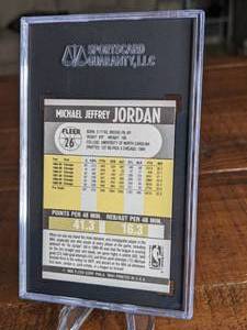 lot 73 image: 1990 - 1991 Fleer #26 Michael Jordan Chicago Bulls Card SGC 9 Mint