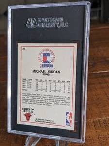 lot 74 image: 1989 - 1990 NBA Hoops Michael Jordan #21 Chicago Bulls All-Star Card SGC 9 Mint