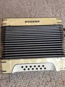 lot 313 image: Hohner Vintage Accordian