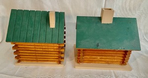 lot 95 image: Log Cabin Figurines