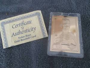 lot 127 image: Nolan Ryan Promint Gold Card...