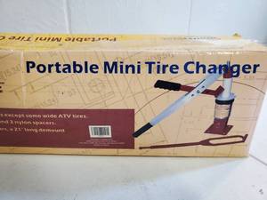 lot 108 image: Brand New Portable Mini Tire Changer